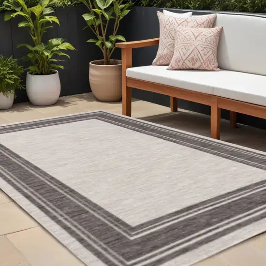 Gray And Ivory Indoor Outdoor Area Rug Photo 1