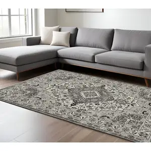 Photo of Gray And Ivory Medallion Area Rug With Fringe