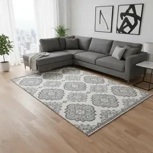 Photo of Gray And Ivory Medallion Washable Area Rug With UV Protection