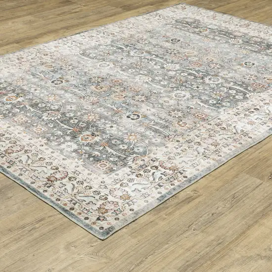 Gray And Ivory Oriental Distressed Area Rug Photo 9