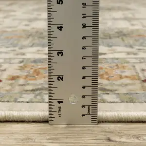 Photo of Gray And Ivory Oriental Power Loom Area Rug With Fringe