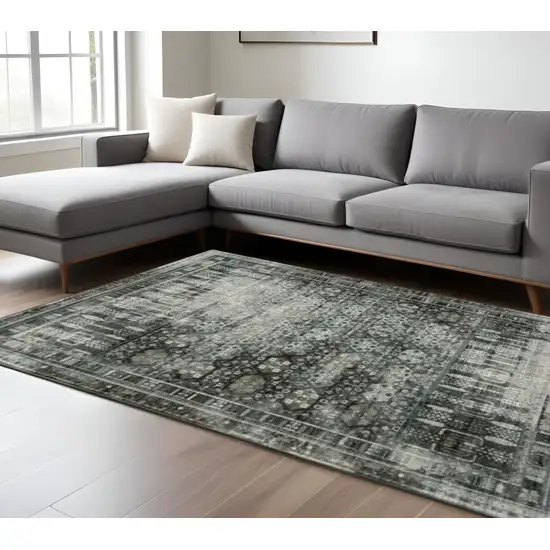 Gray And Ivory Oriental Power Loom Area Rug Photo 1