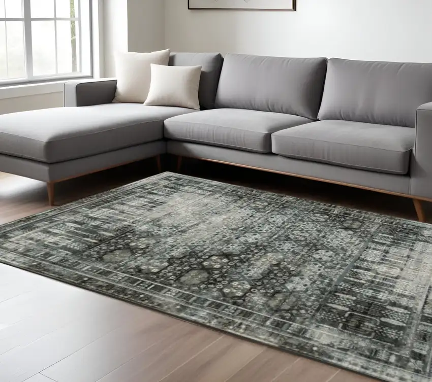 Gray And Ivory Oriental Power Loom Area Rug Photo 1