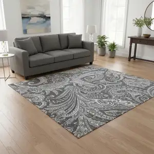 Photo of Gray And Ivory Paisley Washable Area Rug With UV Protection