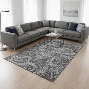 Photo of Gray And Ivory Paisley Washable Area Rug With UV Protection