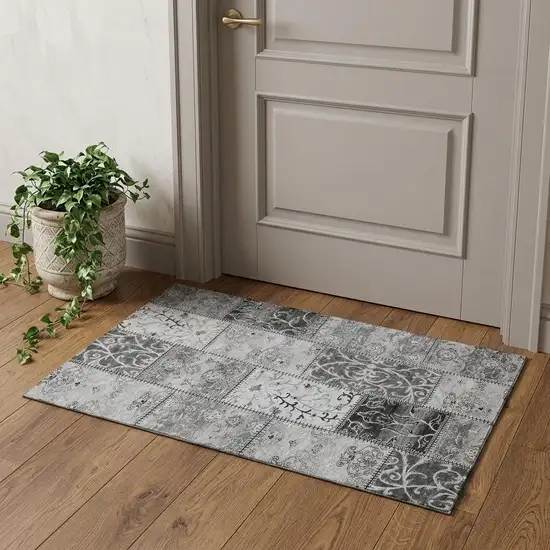 Gray And Ivory Patchwork Distressed Washable Area Rug With UV Protection Photo 1
