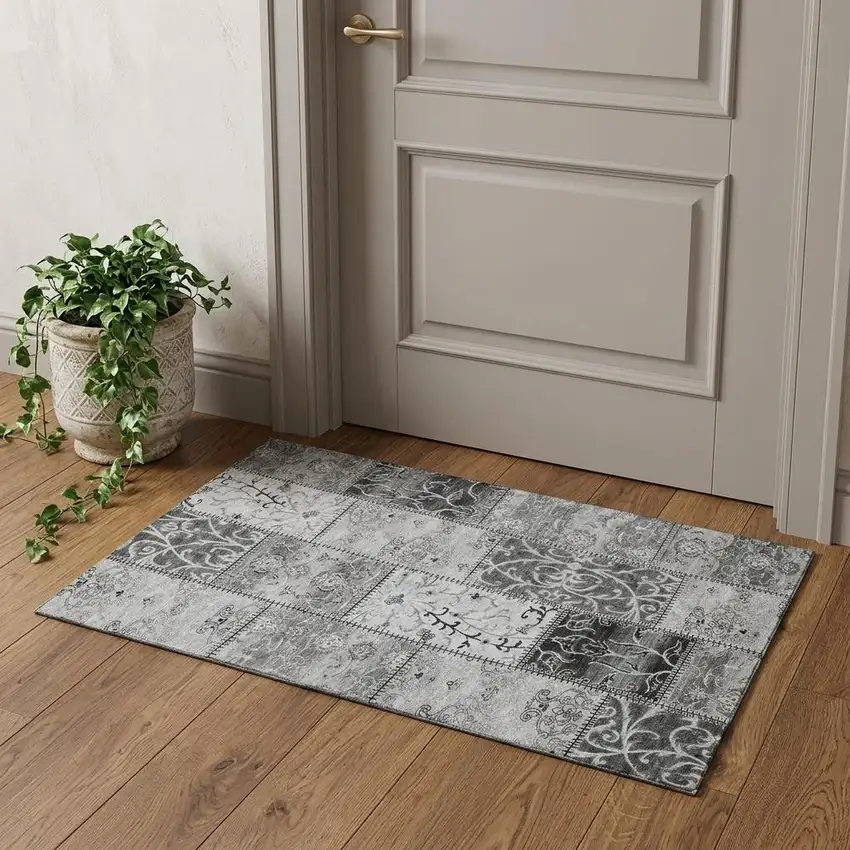 Gray And Ivory Patchwork Distressed Washable Area Rug With UV Protection Photo 1