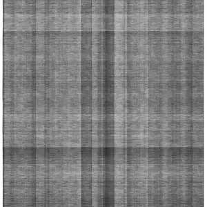Photo of Gray And Ivory Plaid Washable Area Rug With UV Protection