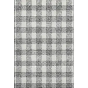 Photo of Gray And Ivory Plaid Washable Area Rug With UV Protection