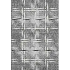 Photo of Gray And Ivory Plaid Washable Area Rug With UV Protection