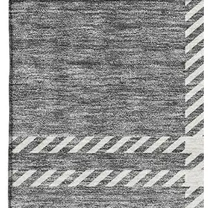 Photo of Gray And Ivory Plaid Washable Area Rug With UV Protection