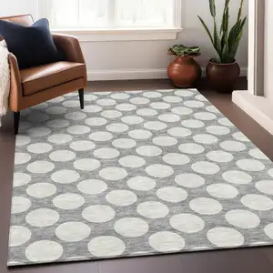 Photo of Gray And Ivory Polka Dot Washable Area Rug With UV Protection