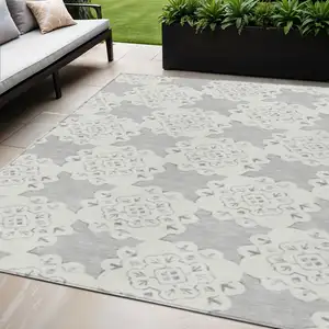 Photo of Gray And Ivory Quatrefoil Washable Indoor Outdoor Area Rug