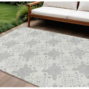 Photo of Gray And Ivory Quatrefoil Washable Indoor Outdoor Area Rug