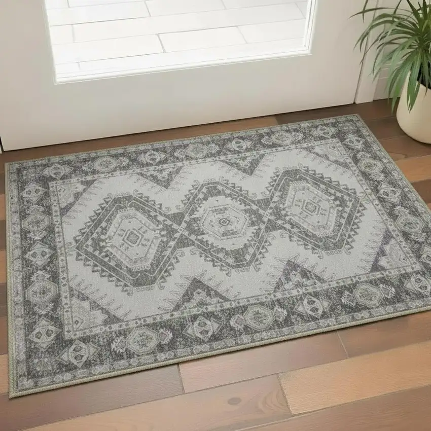 Gray And Ivory Southwestern Distressed Washable Area Rug Photo 1