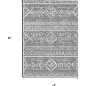 Photo of Gray And Ivory Southwestern Washable Indoor Outdoor Area Rug