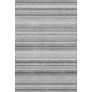 Photo of Gray And Ivory Striped Washable Area Rug With UV Protection