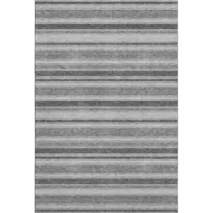 Photo of Gray And Ivory Striped Washable Area Rug With UV Protection