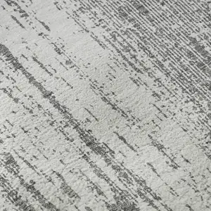 Photo of Gray And Ivory Striped Washable Area Rug With UV Protection