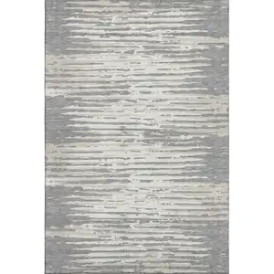 Photo of Gray And Ivory Striped Washable Area Rug With UV Protection