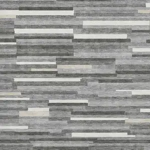 Photo of Gray And Ivory Striped Washable Area Rug With UV Protection