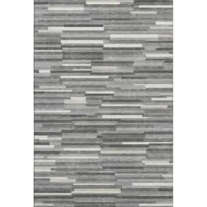 Photo of Gray And Ivory Striped Washable Area Rug With UV Protection