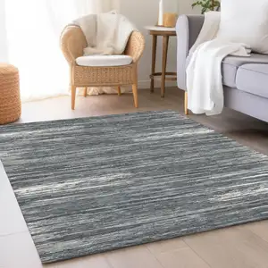 Photo of Gray And Ivory Striped Washable Area Rug With UV Protection