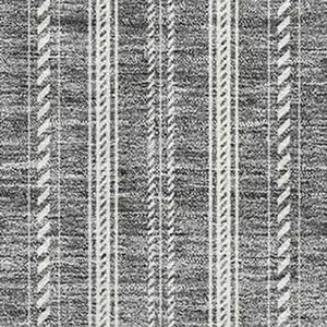 Photo of Gray And Ivory Striped Washable Area Rug With UV Protection