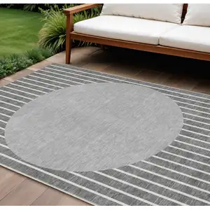 Photo of Gray And Ivory Striped Washable Indoor Outdoor Area Rug
