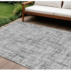 Photo of Gray And Ivory Striped Washable Indoor Outdoor Area Rug