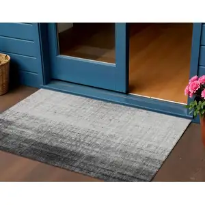 Photo of Gray And Ivory Striped Washable Indoor Outdoor Area Rug