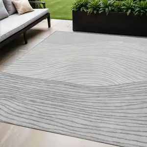 Photo of Gray And Ivory Striped Washable Indoor Outdoor Area Rug