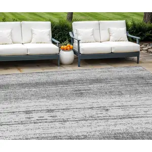 Photo of Gray And Ivory Striped Washable Indoor Outdoor Area Rug