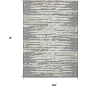 Photo of Gray And Ivory Striped Washable Indoor Outdoor Area Rug