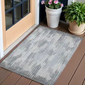 Photo of Gray And Ivory Striped Washable Indoor Outdoor Area Rug