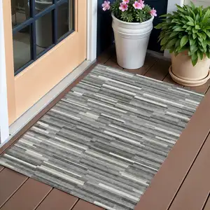 Photo of Gray And Ivory Striped Washable Indoor Outdoor Area Rug