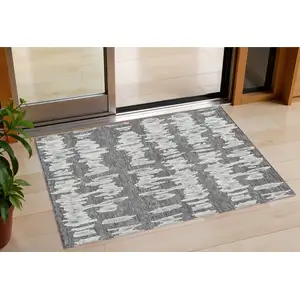 Photo of Gray And Ivory Striped Washable Indoor Outdoor Area Rug