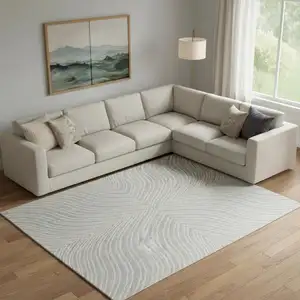Photo of Gray And Ivory Wool Abstract Hand Tufted Area Rug