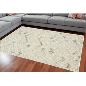 Photo of Gray And Ivory Wool Geometric Tufted Handmade Area Rug