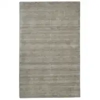 Photo of Gray And Ivory Wool Hand Woven Stain Resistant Area Rug