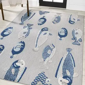 Photo of Gray And Navy Blue Animal Print Indoor Outdoor Area Rug