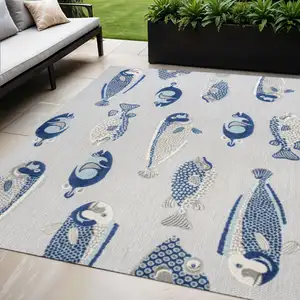 Photo of Gray And Navy Blue Animal Print Indoor Outdoor Area Rug