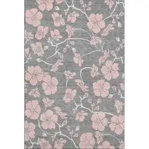 Photo of Gray And Pink Floral Washable Area Rug With UV Protection