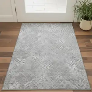 Photo of Gray And Silver Abstract Geometric Washable Area Rug With UV Protection