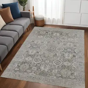 Photo of Gray And Silver Abstract Power Loom Distressed Area Rug