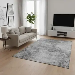 Photo of Gray And Silver Abstract Washable Area Rug With UV Protection