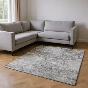 Photo of Gray And Silver Abstract Washable Area Rug With UV Protection
