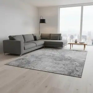 Photo of Gray And Silver Abstract Washable Area Rug With UV Protection