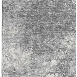 Photo of Gray And Silver Abstract Washable Area Rug With UV Protection