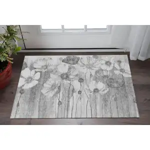 Photo of Gray And Silver Floral Washable Area Rug With UV Protection
